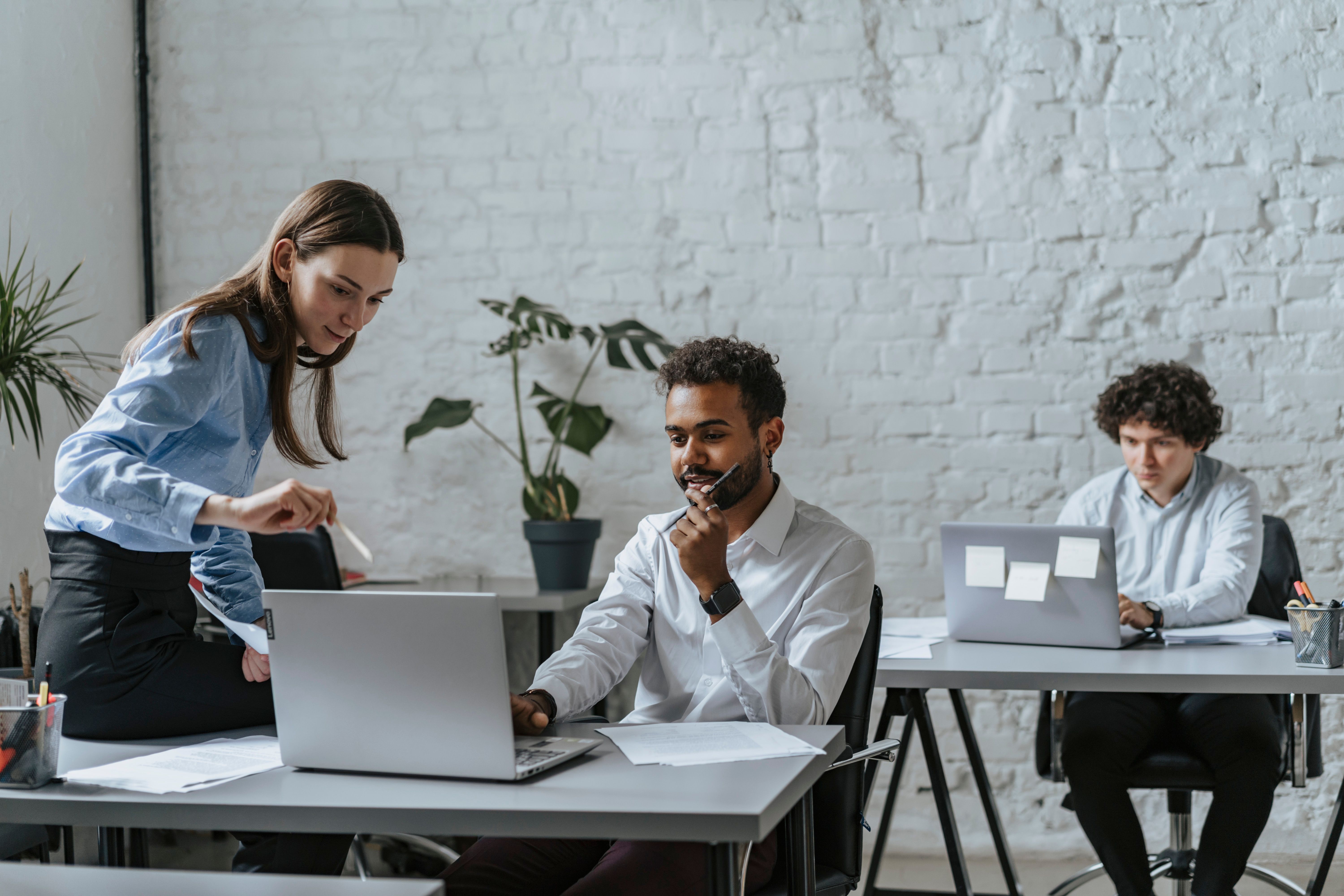 A recruiter and candidate reviewing a job description together