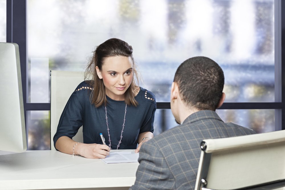 A recruiter assessing a candidate during an interview